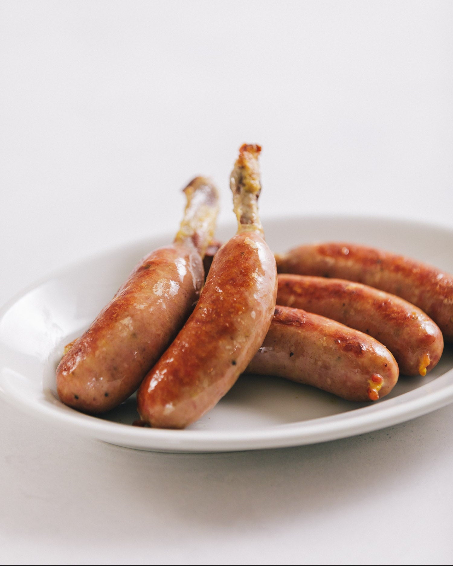 北海道産豚肉使用　骨付き粗挽きソーセージ　40本（4pc）冷凍